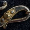 veneziane a lume Vetro lattimo trasparente. Perle nere a punti e oliva centrale nera forata (Venezia 1800).
