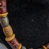 collana con vaghi tubolari in vetro millefiori - bauxite - vetro avvolto con decorazioni scritte. Argenti. 