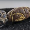 di vaghi di scavo variamente decorati probavilmente provenienti da Turchia o Giava
